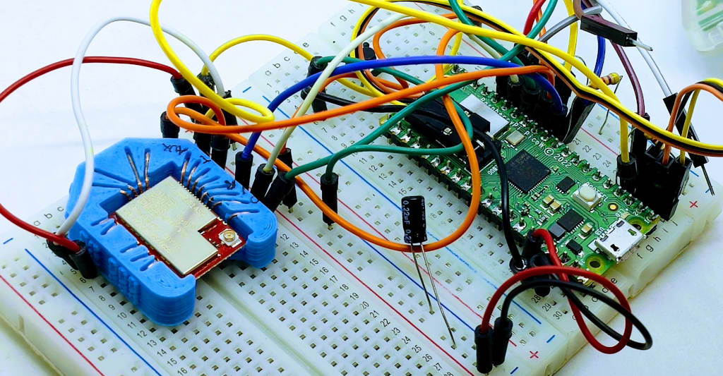 Raspberry Pi Pico (rp2040) and EByte E70 433T14S2 on breadboard with socket adapter